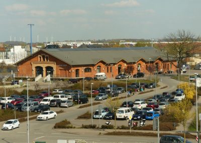 Parkhaus im Weltkulturerbe Wismar - fröhlich, ohne Kitsch und ungetarnt, dafür aber mit Aussicht